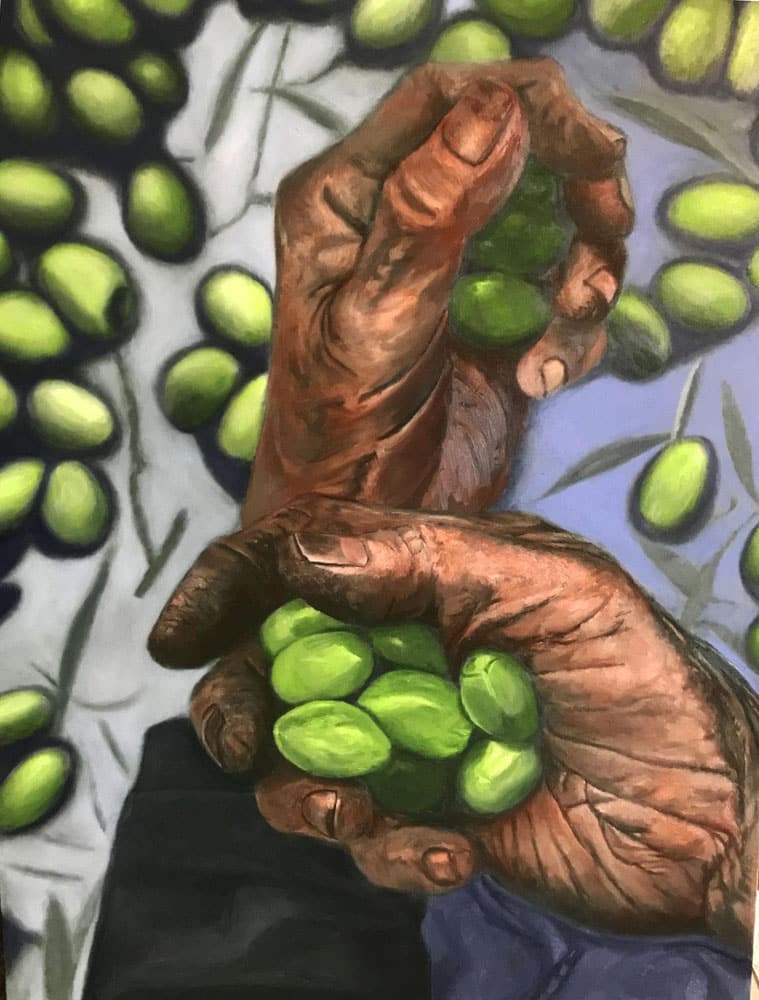 Picture of old hands with almonds in them